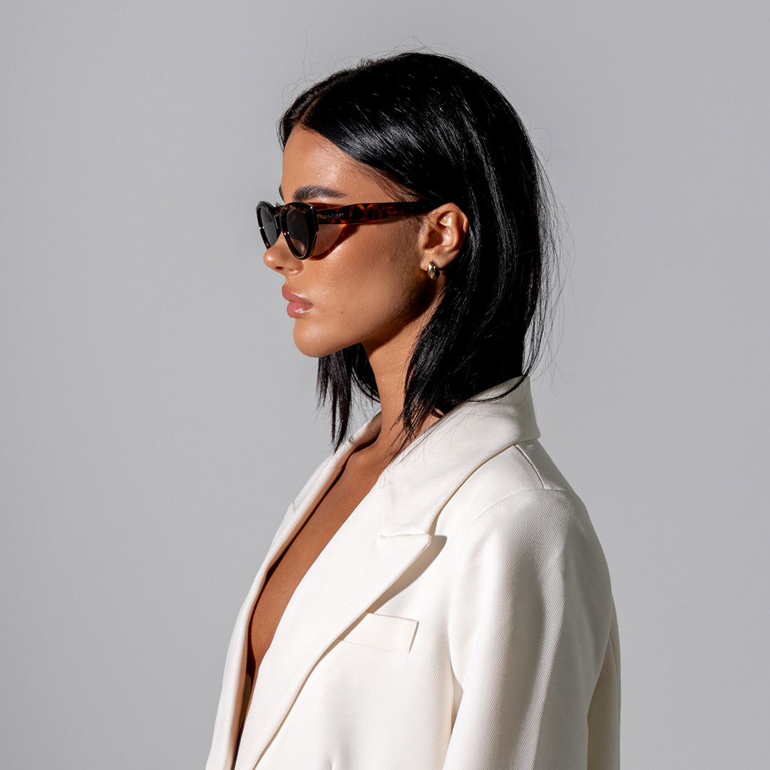 Blakey Tortoise Shell Oval Women's Sunglasses on model side view