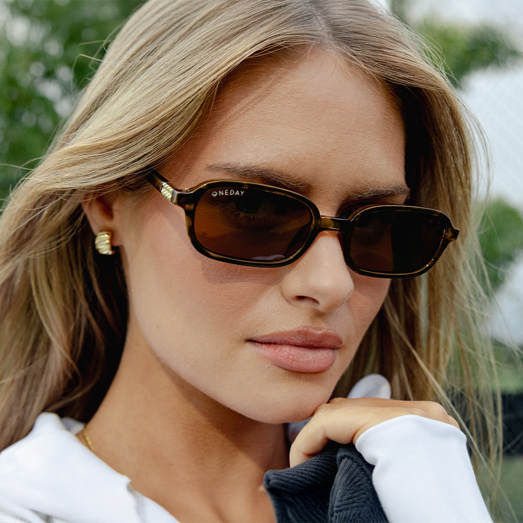 Closeup of female model wearing Ellery Tort Brown by Oneday Australia