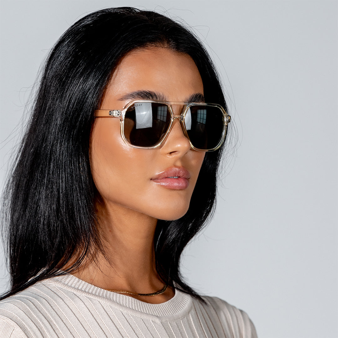 Delilah Champagne Green Aviator Women's Sunglasses on model looking sideways