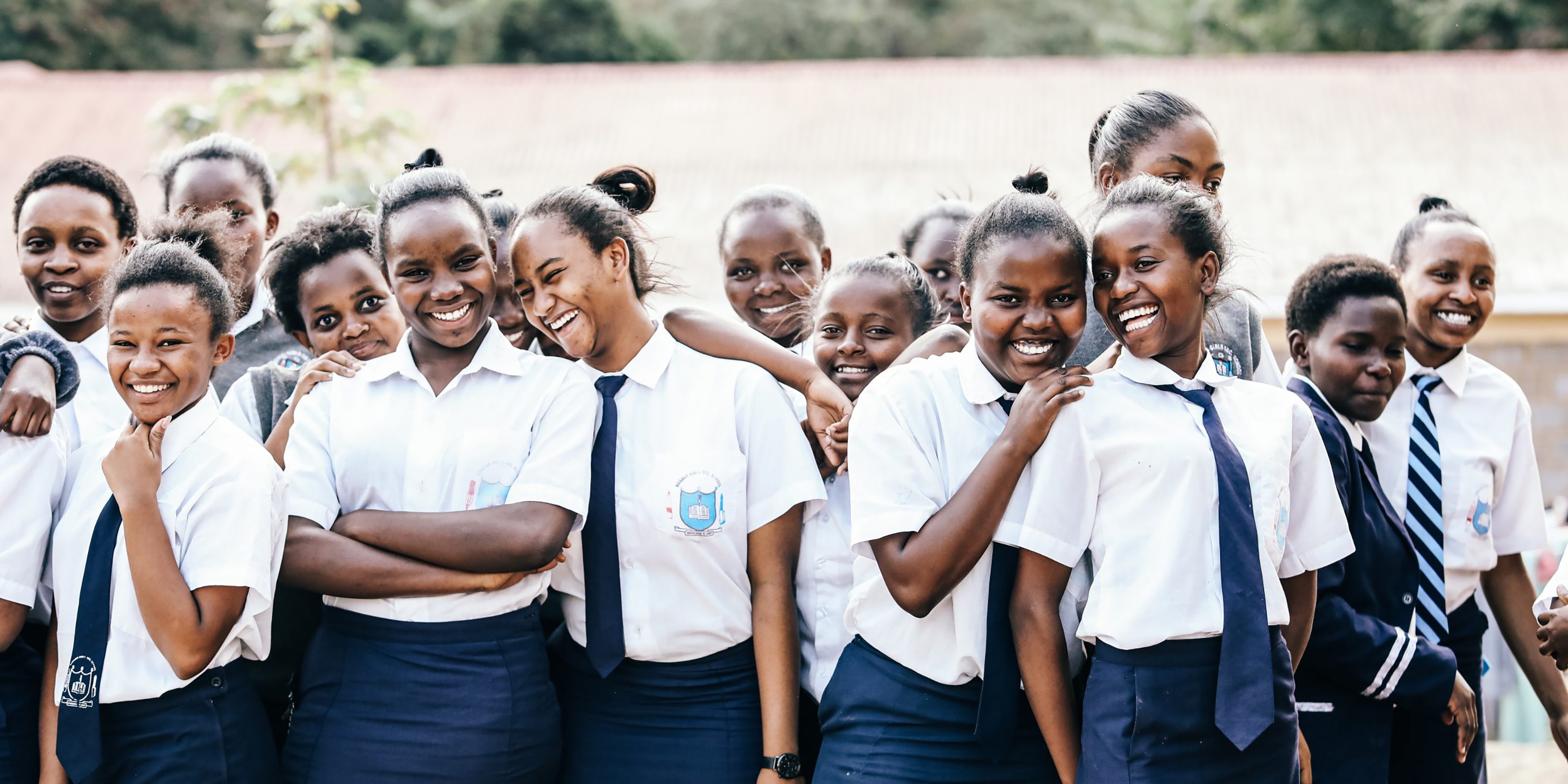 Smiley girls being helped by ONEGIRL - desktop image