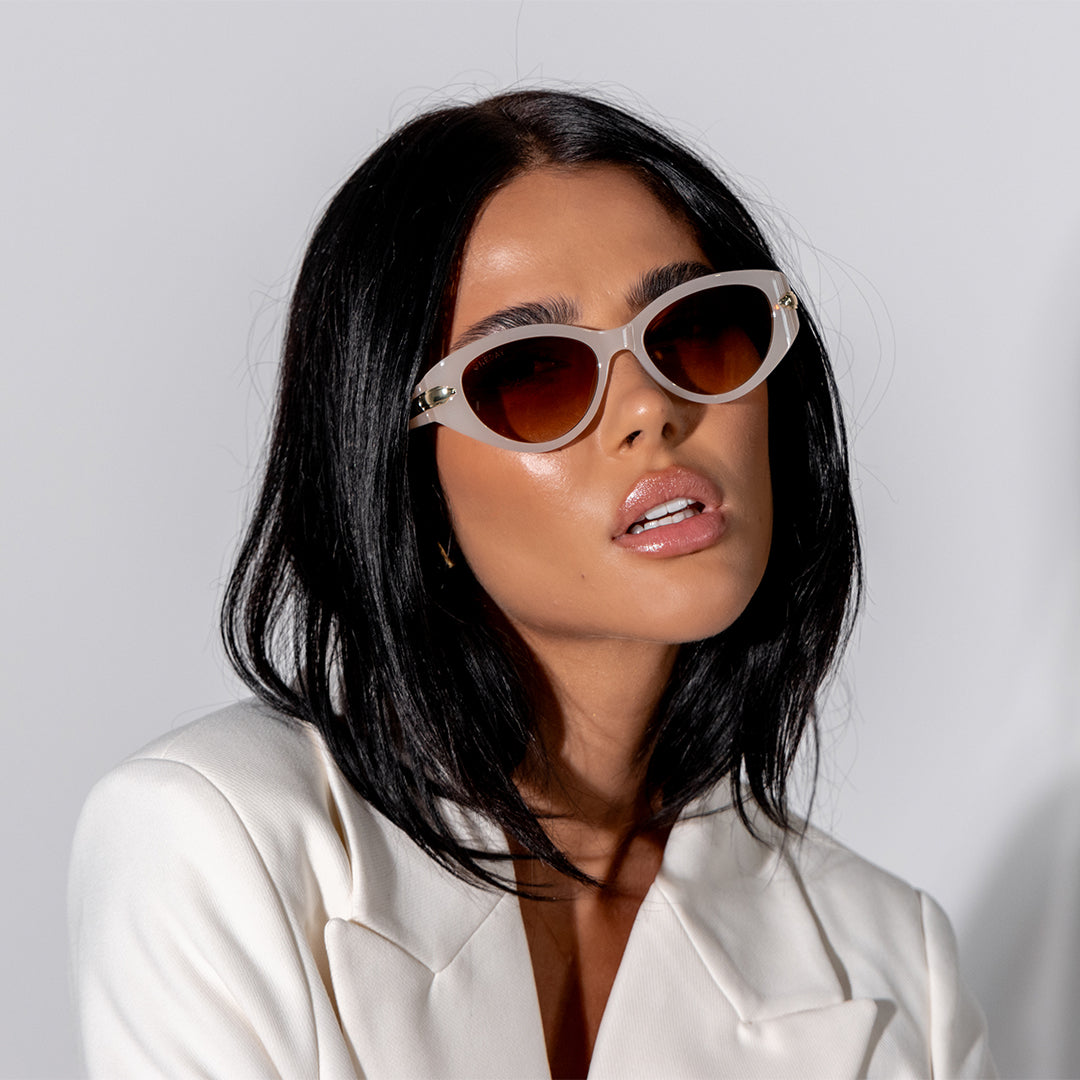 Sofia Cream White Brown Oval Women's Sunglasses on model