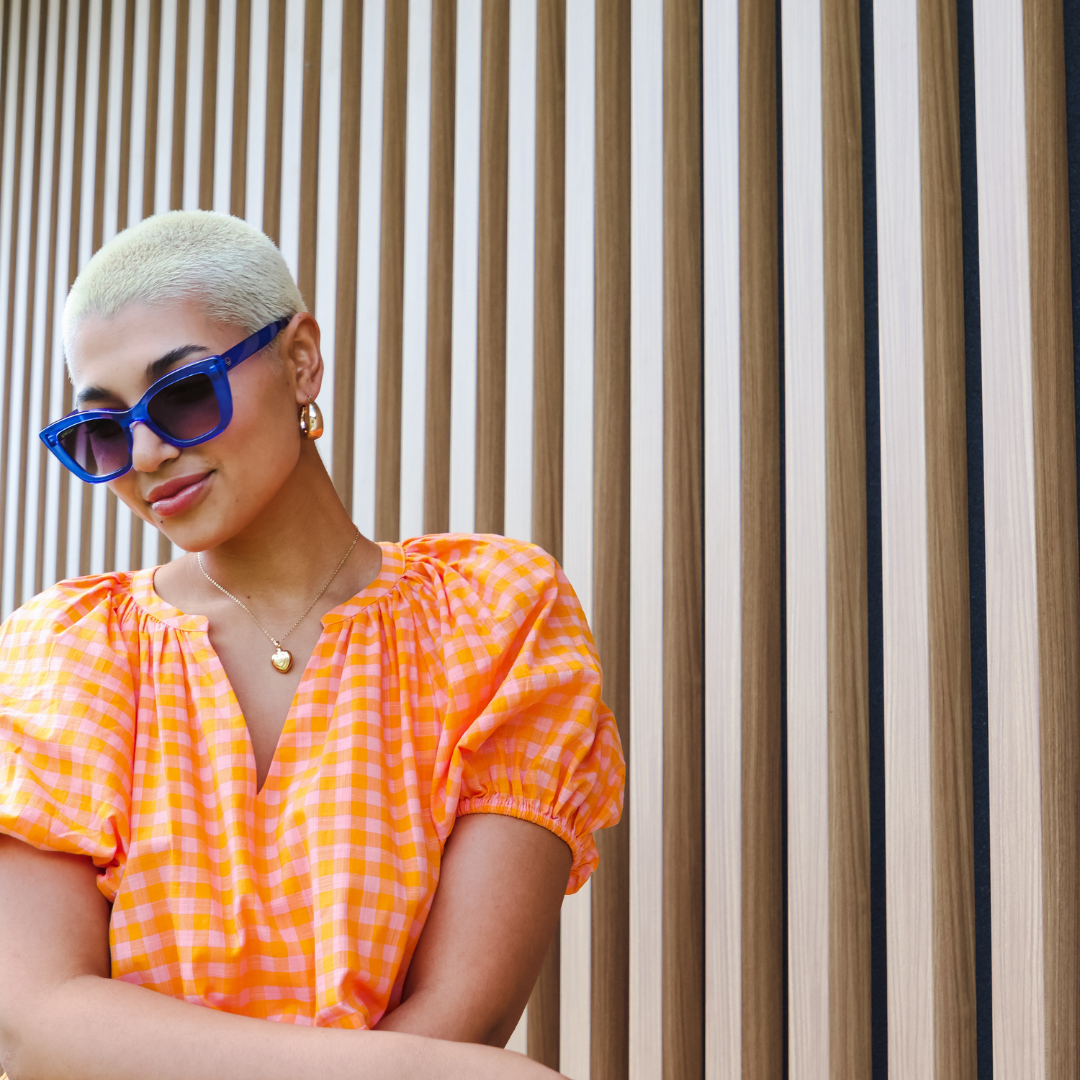 Female model wearing Beach Please - Blue Smoke Gradient while looking down