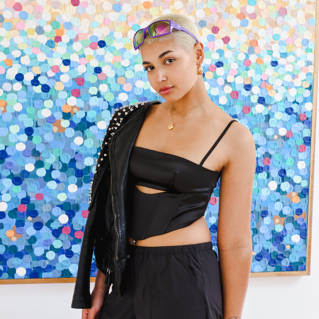Female model wearing Servo - Purple on her head