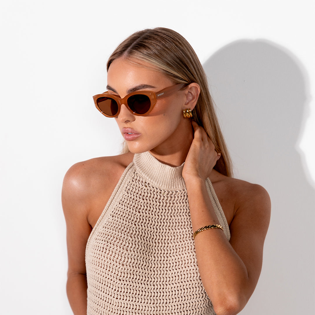 Blakey Brown Oval Women's Sunglasses on model looking sideways