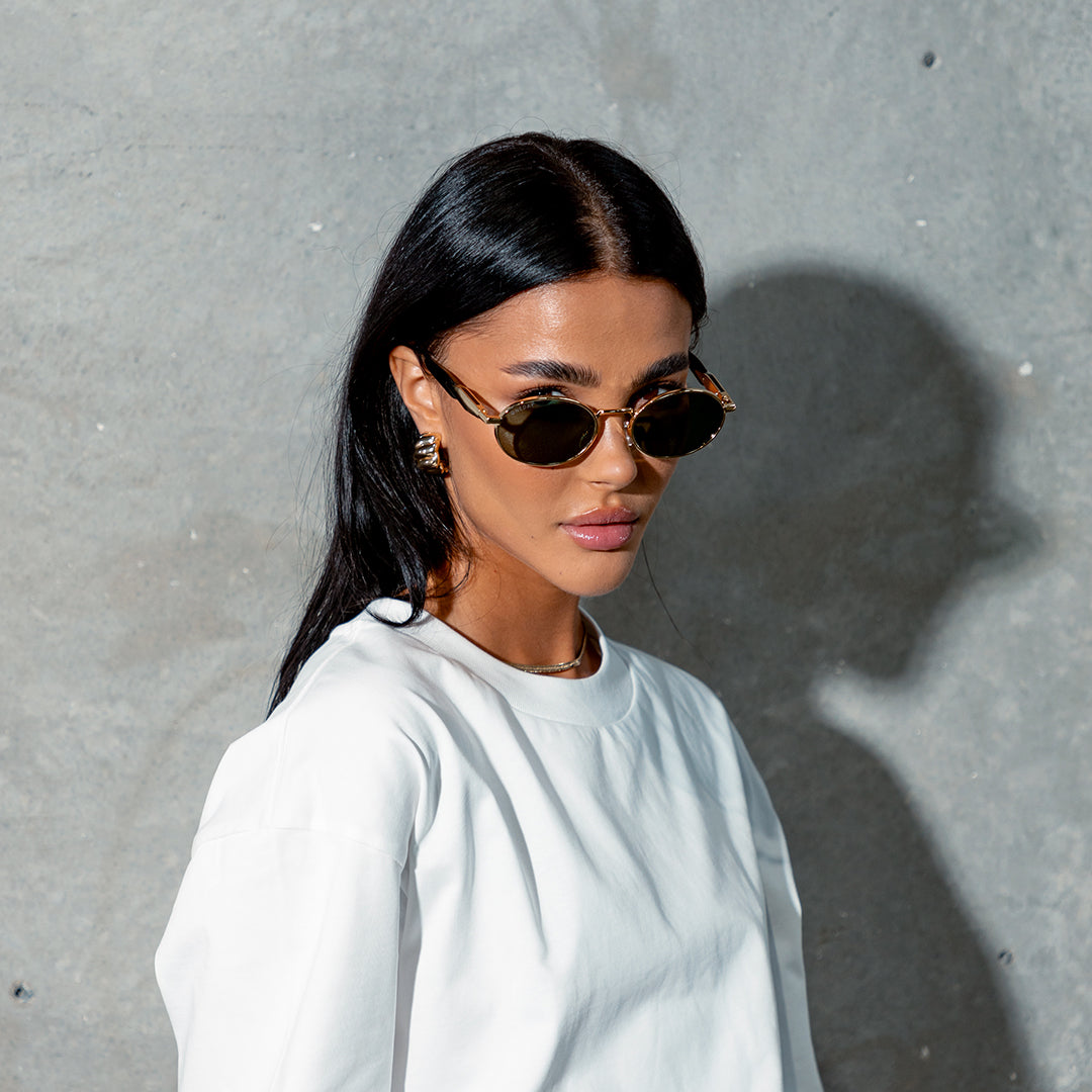 Brooklyn Gold G15 Oval Women's Metal Polarised Sunglasses on model looking at camera