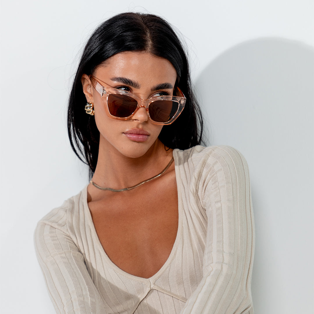 Winona Beige Brown Cats Eye Women's Sunglasses on model looking to the left