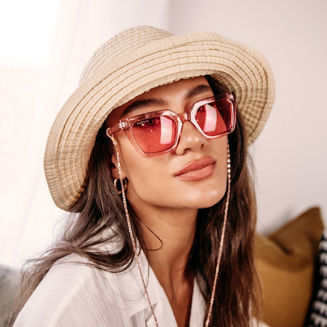 Female model wearing The Weekender Pink Pink Women's Sunglasses