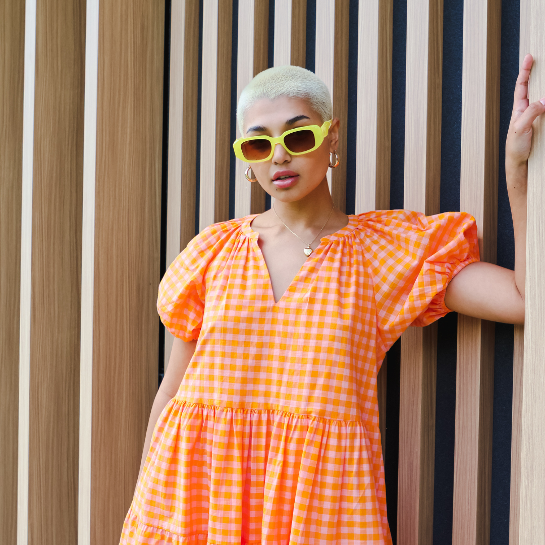 Female model wearing Bejewelled - Yellow Brown while looking at the camera